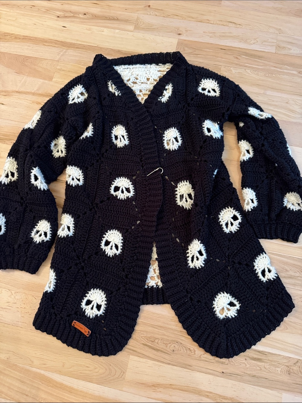 Handmade black cardigan sweater- white crochet skull granny squares-Read